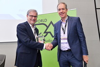 WorldDAB President Patrick Hannon presents the 2017 Award for Outstanding Achievement to Thomas Saner