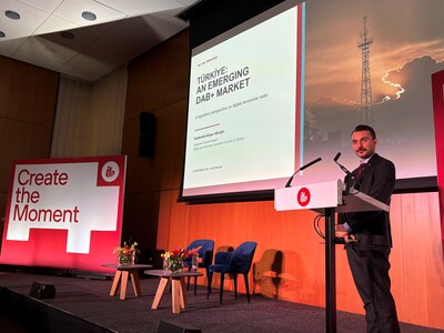 Selahattin Başar Allıoğlu, on stage at IBC2026 in front of a presentation screen