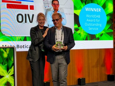 Jacqueline Bierhorst (left) with Mate Botica on stage at WorldDAB General Assembly 2025