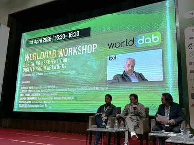 WorldDAB workshop at ABU DBS with three speakers on stage in front of a screen with the session title and a speaker contributing remotely